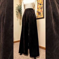 A timeless pair of high waisted, wide leg pants in a rich chocolate brown velvet. The fabric is heavy, making them the perfect cool-weather staple that can be dressed up or down! They feature a back zipper and a large hook and eye closure.  Fabric: velvet/velveteen *CONDITION: Excellent condition, no flaws found upon inspection.  This item will best fit a size Small or 4, but PLEASE see the measurements below for the most accurate representation of size.  **MEASUREMENTS (taken laying flat):  Wai Vintage High Waist Wide Leg Pants For Fall, Vintage Wide Leg Full Length Pants For Fall, Elegant High Waist Velvet Bottoms, Vintage Wide Leg Pants For Fall, Vintage High-waisted Brown Pants, Vintage Brown High-waisted Pants, Vintage Brown Formal Bottoms, Brown Wide Leg Full Length Pants For Formal Occasions, Brown Wide Leg Full Length Pants For Formal