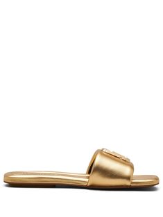 gold-tone calf leather metallic effect gold-tone logo plaque square open toe branded leather insole flat leather sole slip-on style Elegant Gold Leather Slides, Elegant Gold Flat Slides, Classic Gold Leather Sandals, Gold Flat Heel Mules For Formal Occasions, Chic Gold Open Toe Slides, Elegant Gold Slide Sandals, Luxury Formal Flat Slides, Designer Gold Leather Mules, Chic Gold Leather Slides