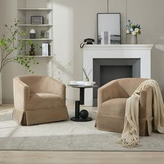 a living room with two chairs and a table in front of a fire place on the wall