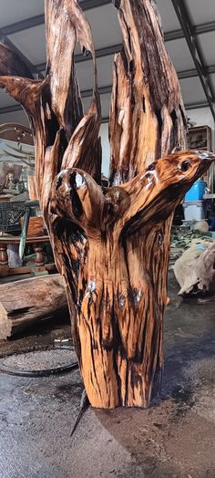 a tree stump that has been turned into a sculpture