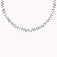 This MG exclusive is a decadent showcase of 24.00 carats of pear-shape diamonds handcrafted in 18K white gold. Dripping in glimmering diamonds, this stunning necklace defies all convention as it delicately drapes across the collar bone. Evoke timeless radiance with this showstopper. White Gold Diamond Cut Necklace For Party, Silver Diamond Necklace For Evening With Single Cut Diamonds, Silver Diamond Cut Necklace For Evening, Dazzling Diamond Necklace With Accents For Evening, Dazzling Diamond Cut Necklace For Evening, Fine Jewelry Diamond Necklace With Sparkling Stones For Evening, Evening White Gold Diamond Tennis Necklace, Dazzling Evening Necklace With Single Cut Diamonds, Diamond White Diamond Cut Necklace For Evening