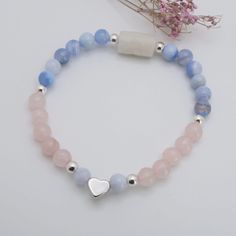 New Mama Bracelet Healing Gemstone Bracelet Infused with Reiki Energy! Makes a great gift for an expecting mom. It Features Grade Blue Lace Agate, Rainbow Moonstone, Pink Quartz, Silver Plated Hematite Accents, and a personalized hand stamped heart that I can Personalize with any initial. Blue Lace Agate is said to instill inner peace and calmness to be patient with the new baby. Because it's such a gentle stone, it helps with the breastfeeding process as it helps keep the new mom stay relaxed a Mama Bracelet, Healing Gemstone Bracelets, New Mama, Crystal Healing Bracelets, Reiki Energy, Healing Energy, Blue Lace Agate, Reiki Healing, Pink Quartz