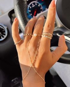 ⚡ ADD TWO OR MORE ITEMS TO THE CART AND ENJOY FREE EXPRESS SHIPPING ⚡ 🚀 DHL - FedEx - UPS (1-4 DAYS DELİVERY) 🚀 Beautifully handcrafted 22k yellow gold plated hand chain bracelet with a front segment of that connects to your finger. Uber chic and modern, this jewelry will be your new obsession! Expertly crafted in glowing 22k gold filled, this beauty is perfect in a fine ring stack for a sophisticated style that you can take anywhere. 💍 💍 ✅Made to Order ✅Finish: 22K GOLD ✅Chain length: Adjus Hand Bracelet With Ring, Hand Jewelry Rings, Hand Chain Jewelry, Finger Bracelets, Hand Chain Bracelet, Modern Gold Jewelry, Pretty Jewelry Necklaces, Y2k Jewelry, Diamond Jewelry Designs