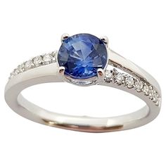 Blue Sapphire 1.07 carats with Diamond 0.16 carat Ring set in 18 Karat White Gold Settings Width: 0.6 cm Length: 0.6 cm Ring Size: 54 Total Weight: 3.25 grams "We first opened doors in 1980 when it was then situated in the vicinity of the Victory Monument; a small and modest storefront with a couple of counters. From its humble beginnings to where it stands today, our company has proven its abilities as a jeweler. Since the beginning, we have been supplying fine quality pieces to dealers, wholes Classic Blue Diamond Ring With Accents, Classic Blue Diamond Ring, Classic Blue Sapphire Ring With Diamond Accents, Classic Blue Diamond Ring With Brilliant Cut, Tanzanite Rings With Diamond Accents In Round Cut, Blue Sapphire Ring With Diamond Accents And Round Cut, Classic Blue Brilliant Cut Diamond Ring, Tanzanite Rings With Diamond Accents Round Cut, Blue Diamond Ring With Round Cut