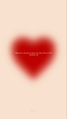 a red heart with a quote on it