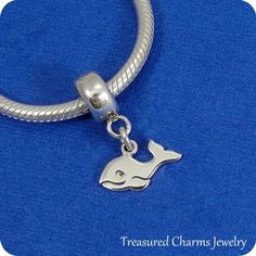 This Whale Charm comes with a silver dangle bead as pictured.  Fits on all major brand European style bracelets. A list of compatible chains is available here: https://etsy.me/2BY7DAW{ DETAILS }★ Material: .925 Sterling Silver★ Finish Color: Silver ★ Dimensions: One-sided★ Charm Size:  1/4" x 1/2"★ Bead Size: 3/16" x 1/4"★ Bead Hole Diameter: 5.5mm★ Bead fits most European style BraceletsPhoto is not to scale and may appear larger to show detail. Refer to exact measurements above.  Bead has a di Silver Dangle Charms For Everyday, Hypoallergenic Dangle Charm Bracelet In Sterling Silver, Everyday Silver Dangle Charms, Silver Charm Bracelet With Lobster Clasp And Round Beads, Silver Stainless Steel Charms With Lobster Clasp, Sterling Silver Charm Bracelet With Removable Dangle Charms, Sterling Silver Charm Bracelet With Removable Charms, Sterling Silver Dangle Charm Bracelet With Removable Charms, Adjustable Silver Dangle Charms