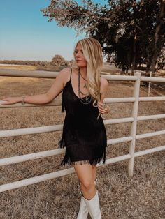 One Chance Fringe Dress Black Fringe Dress Western, Fancy Country Concert Outfit, Fringe Dress With Cowboy Boots, Western Hoco Dress With Boots, Western Hoco Dresses, Black Dress With Cowgirl Boots, Western Cocktail Dress, Western Hoco Dress, Modern Country Outfits