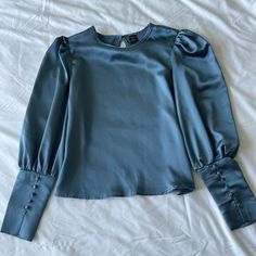 Women’s Blouse From Shein - Never Worn. Elegant Blue Blouse With Puff Sleeves, Elegant Light Blue Tops For Night Out, Elegant Light Blue Top For Night Out, Chic Blue Padded Blouse, Elegant Light Blue Puff Sleeve Tops, Elegant Blue Blouse For Brunch, Boho Pullover, Grey Trench Coat, Orange Blouse