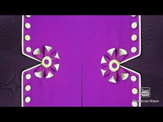 a purple background with white polka dots and a pink flower on the center is an abstract design