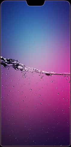 the water is pink and blue with bubbles