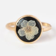 Flowers that last forever!? Real flowers are encased within the resin and inlaid onto gold-filled frames. This collection is hand-crafted and keeps the natural elements of flowers, each piece is one-of-a-kind. A thoughtful gift for anniversary's, graduations or the holiday! Flower Rings, Earrings Charms, Local Eclectic, Diamond Huggies, Velvet Ring Box, Flower Resin, Resin Ring, Necklace Box, Black Jewelry