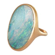 Dalben design 18k rose gold satin finishing ring with a 14,78 carat bezel-set oval light blue Australian Boulder Opal. The opal has pastel light blue-green colors with some pink waves. Ring size 7 1/4 - EU 55 re-sizable to most finger sizes. Bezel setting dimension: width 20 mm, height 27 mm. The ring has been designed and handcrafted in our atelier in Italy Como with a rigorous quality workmanship . Color Stone Jewelry, Opal Rose Gold Ring, Rose Gold Satin, Color Stones Jewelry, Pastel Jewelry, Rose Gold Opal Ring, Ring Rosegold, Australian Boulder Opal, Light Blue Green