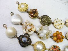 These gorgeous bracelets are fashioned from 'repurposed' vintage earrings. The earrings range from crystal clear rhinestones, faux pearls, ivory, crystals, Aurora Borealis, varying colors per set - gold accents, silver accents -- all on silver tone and gold tone . Great bracelet for that special occasion, bride or bridesmaid. Wedding APPEAL! AMAZING sparkle for the BRIDE or bridesmaid! They sit on a bracelet that is aprox. 7.25 inches long and is matte silver tone - nickel free and oxidized. I u Vintage Jewelry With Bead Caps And Round Beads, Vintage Jewelry Bead Caps For Jewelry Making, Vintage Gold Jewelry With Bead Caps, Vintage Metal Jewelry With Round Beads, Vintage Style Nickel Free Jewelry With Round Beads, Vintage Nickel-free Jewelry With Round Beads, Vintage Repurposed, Repurposed Vintage, Vintage Beads