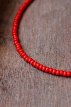 Bright minimalist beaded choker with red czech glass beads, strong double nylon thread, silver tone clasps, silver tone lobster clasp and stainless steel adjustable length chain. Perfect for everyday wear or a pretty gift for someone special! You can wearing it with other chokers, chain necklaces or alone! Total length of necklace is 43 cm or 16.9 inches and 4,5 cm of adjustable length chain. NOTE: in my store you can also find similar necklaces in other colors as in the last photo. The price is Red Minimalist Beaded Necklace With Tiny Beads, Minimalist Red Beaded Necklaces, Minimalist Red Beaded Necklace With Tiny Beads, Minimalist Red Beaded Necklace, Adjustable Red Choker With Round Beads, Adjustable Red Choker With Tiny Beads, Adjustable Single Strand Red Beads, Adjustable Red Beaded Necklace With Lobster Clasp, Red Minimalist Beaded Necklace