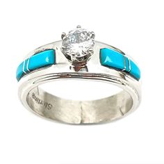 Stunning Navajo Sterling Silver Turquoise Inlay Engagement Ring In Size 9. The Ring Features Intricately Hand Etched, Turquoise Inlay Design In Sterling Silver Accented With A Round 5mm Cubic Zirconia. The Ring Measures 5/16 Inch Wide In The Center And Tapers Down. Hand Etched By The Talented Navajo Artist Wilber Muskett. Stunning Native American Engagement Ring! Native American Engagement Ring, Turquoise Engagement Ring, Turquoise Ring Engagement, Spiny Oyster Jewelry, Inlay Design, Engagement Ring Size, Navajo Turquoise, Royston Turquoise, Southwestern Jewelry