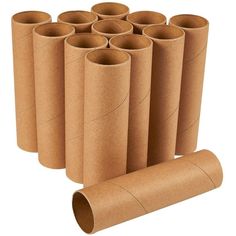 several rolls of toilet paper are lined up in a row on a white background,