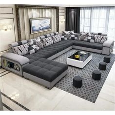 a modern living room with grey and white furniture