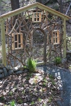 a small wooden structure made out of branches