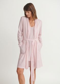 Wrap yourself in comfort with the Coleen Robe. Made from 100% organic Pima cotton, this lightweight robe features side pockets and an attached belt to you can always find. Its breathable fabric makes it perfect for everyday lounging, offering luxurious softness and style. Available in a variety of colors, the Coleen Robe is your go-to for post-bath relaxation or lazy mornings. Pair it with the Sexy Slip for a matching look. Spring Relaxation Robe With Tie Waist, Spring Lounging Robe With Tie Waist, Spring Loungewear Robe Relaxed Fit, Casual Robe With Relaxed Fit For Loungewear, Casual Relaxed Fit Robe For Loungewear, Spring Loungewear Sleepwear With Tie Waist, Spring Sleepwear With Tie Waist For Loungewear, Tie Waist Wrap Sleepwear For Loungewear, Wrap Sleepwear With Tie Waist For Loungewear