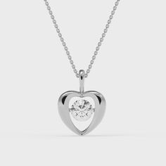 1 00 Ctw Round Cut Moissanite Solitaire Heart Shape necklace in Sterling Silver with Chain This Moissanite Heart Shape pendant will bring a classic sparkle to your neck Luxury Heart Cut Solitaire Necklace, Silver Moissanite Heart Pendant Necklace, Classic Heart Cut Solitaire Necklace With Diamond Accents, Classic White Gold Heart Necklace With Brilliant Cut, Classic Diamond Heart Necklace With Diamond Cut, Elegant Heart Cut Necklace With Single Diamond, Classic Round White Gold Heart Necklace, Classic Round Cut Heart Necklace For Formal Occasions, Formal Diamond Cut Heart Necklace