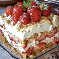 there is a cake with strawberries on top