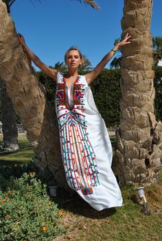 "This bohemian cotton caftan is a summer breeze and a colorful addition to your wardrobe! It is an extremely comfortable wear, light and soft and can be used on many occasions - home gatherings, festival parties, summer occasions, dinners, or just in your home to feel comfortable. -----------Medium------------ Bust : 39-40 Hip : 45-46 -----------Large---------------- Bust : 44-45 Hip : 50-51 -----------X-Large-------------- Bust : 47-48 Hip : 53-54 -----------XX-Large-------------- Bust : 49-50 Traditional White Sleeveless Dress, Summer V-neck Dress With Geometric Embroidery, Sleeveless Embroidered Dress For Vacation, V-neck Embroidered Maxi Dress For Summer, White V-neck Dress With Geometric Embroidery, Spring Embroidered Beachwear Maxi Dress, Sleeveless Summer Dresses With Geometric Embroidery, Embroidered Maxi Dress For Summer Vacation, Sleeveless Floral Embroidered Dress For Beach Season