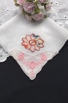 Delightful Embroidered and Appliquéd Pink and Red Floral Handkerchief, Hankerchief, Wedding Hankie, Hanky Condition: Excellent vintage condition. Size: 10-1/4 inches square Hem: Scalloped Materials : Cotton Age : 1950's to 1960's Colors: Pink, Red and White Motif : Embroidered Floral Wedding hankie Fabric note : Most of my hankies are nearly 70 years old and the fabric is quite delicate. Use with care. Some repurposed vintage hanky ideas : baby bonnets, doillies, change purses, collars & poc Embroidered White Handkerchief Gift, White Embroidered Handkerchiefs As Gift, Traditional Floral Embroidered Handkerchiefs As Gift, Vintage Embroidered Handkerchiefs For Wedding, Vintage Embroidered Wedding Handkerchiefs, White Floral Embroidered Handkerchiefs For Gifts, White Floral Embroidery Handkerchiefs For Gift, Embroidered Flower Handkerchiefs For Gifts, Flower-shaped Embroidered Handkerchiefs For Gifts