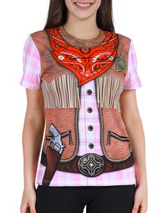 a woman wearing a pink and black shirt with an image of a cowboy on it