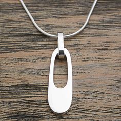 Contemporary Pendant Jewelry, Modern Jewelry With Large Rectangular Pendant, Modern Teardrop Pendant Necklaces, Modern Teardrop Pendant Necklace With Large Pendant, Modern Teardrop Pendant Necklace With Polished Finish, Modern Sterling Silver Rectangular Pendant Jewelry, Modern Sterling Silver Oval Pendant Jewelry, Contemporary Sterling Silver Necklace With Polished Finish, Modern Sterling Silver Jewelry With Rectangular Pendant