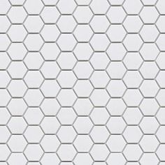 a white tile pattern with hexagonal shapes