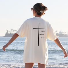 Jesus Shirt Way Truth Life Shirt Minimalist Christian Tshirt Simple Christian Shirt Gift for Adult Baptism John 14:6 Shirt Religious Apparel Oversized Christian Shirt This Comfort Colors shirt features a simple back design of a large cross and the text "way truth life" - in reference to John 14:6. The front has a small matching cross on the center of the chest. Perfect for anyone who prefers a minimalistic style but still wants to showcase their faith! Available in ivory and pepper. ✿ The With A Christian Tshirts Design, Short Sleeve Tops For Summer Baptism, Adult Baptism, Christian Tshirt, Jesus Shirt, Christian Apparel, Christian Shirt, Comfort Colors Tee, Jesus Shirts