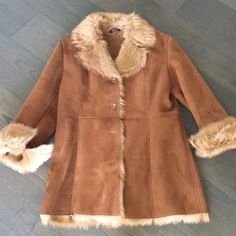 Warm And Cozy Coat,Tan/Brown Color, Never Worn Before, Doesn’t Have Tag. Brown Long Coat For Cold Weather, Brown Long Sleeve Winter Outerwear, Cozy Brown Outerwear With Faux Fur Trim, Cold Weather Pea Coat With Faux Fur Trim, Winter Brown Pea Coat With Pockets, Brown Winter Outerwear For Cold Weather, Brown Long Coat With Faux Fur Lining, Fall Long Pea Coat With Faux Fur Lining, Brown Long Pea Coat For Winter