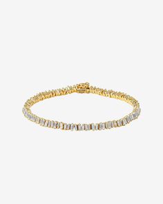 This Classic Diamond Mini Baguette Tennis Bracelet is one of our bestselling styles. We love this piece for its elegance and wear-ability. Beautiful mini baguette diamonds are meticulously set in a vertically staggered setting for a modern feel. Stack it next to one of our bangles for an elevated look. Details 18k rose gold, white gold or yellow gold 2.90 carats of baguette diamonds Bracelet measures 7" inches in length 4mm width Ref: AKB348 Formal Diamond Bracelet With Baguette Diamonds, Modern Diamond Bracelet With Baguette Cut Accents, Modern Baguette Cut Diamond Bracelet For Anniversary, Modern Baguette Cut Diamond Bracelet With Accents, Evening Jewelry With Baguette Diamonds In Rectangular Shape, Rectangular Baguette Diamond Jewelry For Evening, Baguette Diamond Jewelry For Evening, Modern Baguette Cut Diamond Bracelet, Luxury Diamond Bracelet With Baguette Diamonds For Formal Occasions