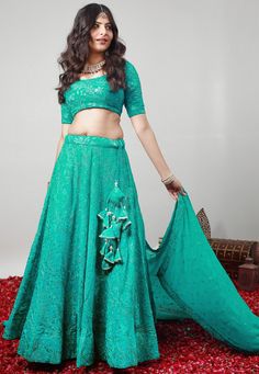 Readymade Embroidered Faux Georgette Lehenga in Turquoise This attire with Cotton Lining is Enhanced with Resham, Zari and Sequins Work. Crafted in Round Neck and Half Sleeve Available with a Faux Georgette Choli and a Faux Georgette Dupatta in Turquoise The Choli and Lehenga Length are 12 to 15 and 42 inches respectively Do note: Accessories shown in the image are for presentation purposes only.(Slight variation in actual color vs. image is possible). We sell all kinds of Lehenga and Chaniya Ch Turquoise Anarkali Lehenga With Pallu, Designer Turquoise Lehenga With Dupatta, Anarkali Style Turquoise Lehenga With Pallu, Turquoise Anarkali Lehenga With Zari Work, Designer Turquoise Lehenga With Pallu, Turquoise Lehenga With Zari Work For Navratri, Turquoise Semi-stitched Lehenga For Navratri, Turquoise Designer Lehenga For Navratri, Designer Wear Turquoise Lehenga For Navratri