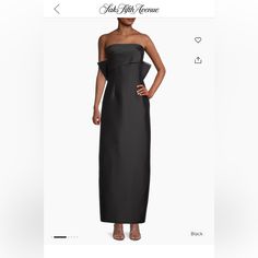 a woman in a black dress is on the web page for her fashion store, which sells