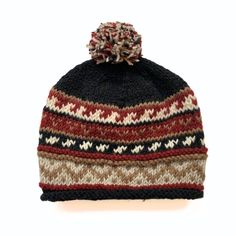 This 100% wool stocking hat keeps you warm and looking good . It is fully lined with soft fleece. It's sure to be a great look on both men and women. Handmade in Nepal Materials: 100% wool (outer), polar fleece (interior) One size fits most Cold water hand wash (or dry clean); lay flat to dry With every product you purchase, you are helping provide employment, educational opportunities and medical care to artisans in Nepal. Warm Wool Beanie For Winter, Warm Wool Bonnet For Winter, Warm Wool Winter Bonnet, Wool Hats For Winter Cold Weather, Wool Bonnet For Cold Weather, Winter Wool Bonnet For Cold Weather, Cozy Winter Wool Hat, Wool Hat One Size For Outdoor, Winter Wool Hats One Size Fits Most