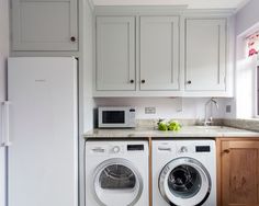 a washer and dryer in a small kitchen