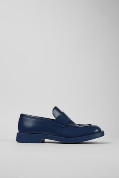 Neuman Blue Loafers for Unisex - Fall/Winter collection - Camper USA Modern Leather Slip-on Shoes With Vibram Sole, Modern Slip-on Leather Shoes With Vibram Sole, Modern Moccasins With Rubber Sole For Work, Modern Workwear Moccasins With Rubber Sole, Modern Slip-on Loafers With Vibram Sole, Modern Loafers With Rubber Sole, Modern Plain Toe Loafers With Rubber Sole, Modern Loafers With Removable Insole And Round Toe, Calf Leather Loafers With Vibram Sole