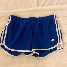 New With Tags. Bright Blue Adidas Running Shorts With 3” Inseam. Super Comfortable And Made Of A Lightweight Material Which Makes Them Great For Working Out Or Lounging. The Last Image Is A Stock Photo Of The Same Shorts In A Different Color Way. Blue Adidas Shorts, Adidas Shorts Women, Adidas Running Shorts, Running Shorts Women, Fame Dr, St Ives, Adidas Shorts, Adidas Running, Cute Everyday Outfits