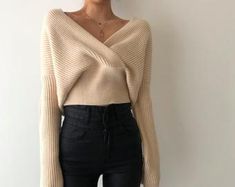 Beige Cable Knit V-neck Top, Chic Cream Soft Knit Cropped Sweater, Chic Chunky Knit Cropped Sweater For Layering, Chic Soft Knit Cropped Sweater, Oversized Soft Knit Chic Top, Chic Oversized Soft Knit Top, Chic Oversized Cable Knit Top, Chic Beige Soft Knit Cropped Sweater, Chic Cream Winter Tops