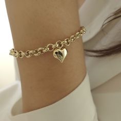 "\"Thick Rolo Chain, Heart Charm, 14k Gold Bracelet | Fine Jewelry in Love Puffy Heart Minimalist Bracelet for Everyday Use | Gift for Her\" P R O P E R T I E S The best finishing touch to every ensemble is our classic 14k gold rolo chain bracelet with a chic heart charm. It's stunning on its own, but it's also great with other bracelets for a more impressive look. This lovely charm bracelet is a timeless look that will be a go-to piece of your jewelry collection for decades to come. * Material: Minimalist Heart Bracelet For Anniversary, Elegant Everyday Heart Bracelet With Charms, Dainty Heart Bracelet For Valentine's Day, Rose Gold Chain Bracelet With Heart Charm, Heart Pendant Bracelet With Charm, Everyday Heart Pendant Bracelet With Charm, Heart Charm Bracelets With Heart Pendant, Elegant Everyday Charm Bracelet For Valentine's Day, Everyday Rose Gold Heart Bracelets