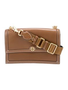 Tory Burch Shoulder BagBrown LeatherGold-Tone HardwareSingle Adjustable Shoulder StrapLeather Lining & Three Interior PocketsSnap Closure at FrontIncludes Dust BagUnfortunately, due to restrictions, this item may not be eligible for shipping in all areas. High-end Brown Shoulder Bag With Gold-tone Hardware, Brown Shoulder Bag With Gold-tone Hardware, Designer Brown Shoulder Bag With Gold-tone Hardware, Leather Crossbody Bag Tory Burch, Tory Burch Ivory Bags, Leather Shoulder Bag, Tory Burch, Women Handbags, Handbags