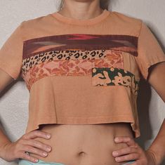 1/2 Off Women's Urban Outfitters Cropped Peach Shirt Medium Animal Floral Prints Add A Pop Of Color And Hint Of Animal Print To Your Wardrobe With This Urban Outfitters Cropped Shirt. The Short-Sleeved Crew Neck Top Features A Vibrant Orange Color And A Unique Animal Floral Print Patchwork Design. It's Made From 100% Cotton For A Comfortable Fit, And The Pullover Closure Makes It Easy To Wear On Any Occasion, Whether It's For Travel Or A Casual Day Out. This Regular Fit Shirt Comes In A Size Med Distressed Dress, Peach Shirt, Pink Floyd Dark Side, Urban Outfitters Women, Cropped Shirt, Patchwork Designs, Crew Neck Top, Urban Outfitters Tops, Vibrant Orange