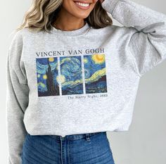 Starry Night, Wherever You Go: Channel your inner artist with this comfy Van Gogh sweatshirt. Featuring a vintage-inspired Starry Night grid design, it's the perfect gift for any art lover or a unique addition to your art teacher's wardrobe. PRODUCT DETAILS Ideal for any situation, a unisex heavy blend crewneck sweatshirt is pure comfort. These garments are made from polyester and cotton. This combination helps designs come out looking fresh and beautiful. The collar is ribbed knit, so it retain Artistic Crew Neck Sweatshirt With Letter Print, Van Gogh Sweater, Painted Sweatshirt, Teacher Wardrobe, Starry Night Painting, Night Painting, Grid Design, Sweatshirt Vintage, Christmas 2024