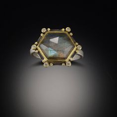 This lovely ring features a luminous rose cut labradorite set in 22k gold. It's accented with warm hammered 22k gold dots and sparkling diamonds. This stone picks up many colors, and is truly magical, creating a very special piece. Stone measures 1/2 inch across. Sterling silver back and band. Matte finish. Geometric Silver Jewellery, Silver Stone Ring, Gem Rings, Silver Necklace Simple, Cheap Silver Rings, Handmade Gold Jewellery, Silver Rings With Stones, Jewelry Drawing, Silver Jewelry Design