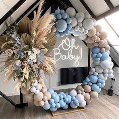 a baby shower decoration made out of balloons