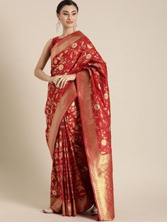 Red and Gold-coloured banarasi woven design saree and has a zari borderThe model is wearing a stitched version of the blouse piece. The saree comes with an unstitched blouse piece. Pre-draped Meenakari Saree For Puja, Red Paithani Silk Pre-draped Saree With Pallu, Red Paithani Silk Pre-draped Saree With Unstitched Blouse, Red Paithani Silk Pre-draped Saree With Cutdana, Red Pre-draped Saree With Unstitched Blouse In Paithani Silk, Jamawar Blouse Piece For Puja, Red Paithani Silk Saree With Meenakari Details, Red Paithani Silk Pre-draped Saree For Diwali, Red Pre-draped Saree With Zari Weaving In Jamawar