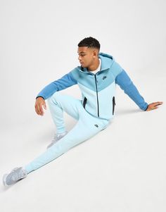 Whether you're kickin' back or heading out, do it in style and comfort with these men's Tech Fleece Joggers from Nike. In a Glacier Blue colourway, these slim, tapered joggers are cut from soft Tech Fleece fabric for everyday comfort. They feature an elasticated, drawcord waistband for an adjustable fit, with ribbed cuffs to hold the shape and side pockets and a zip-up pouch for storage. Finished up with signature Futura branding. Machine washable | Our model is 6'1" and wears a size medium. Blue Nike Joggers, Nike Tech Fleece Joggers, Nike React Vision, Tapered Joggers, Nike Joggers, Joggers Track Pants, Nike Tech Fleece, Nike Tech, Tech Fleece