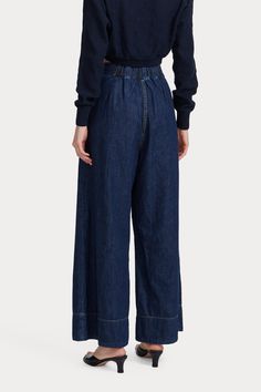 An RC go-to pant, the Coxsone is an easy, pleated, high-waisted trouser with a wide leg, cut this season in Vista Denim. 100% Cotton Faux button fly Invisible side zipper Elastic waistband at back Side slip pockets Made in USA Dark Wash Wide Leg Pants For Work, Denim Wide Leg Pants For Work, High Waist Wide Leg Pants For Spring, High Waist Wide Leg Pants For Spring Smart Casual, Dark Wash Wide Leg Work Pants With Five Pockets, Chic Dark Wash Wide Leg Pants For Work, Denim High-waisted Wide Leg Workwear Pants, Denim High-waisted Wide Leg Pants For Work, Dark Wash Wide Leg Pants For Work In Spring