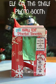 an elf's photo booth made out of cardboard